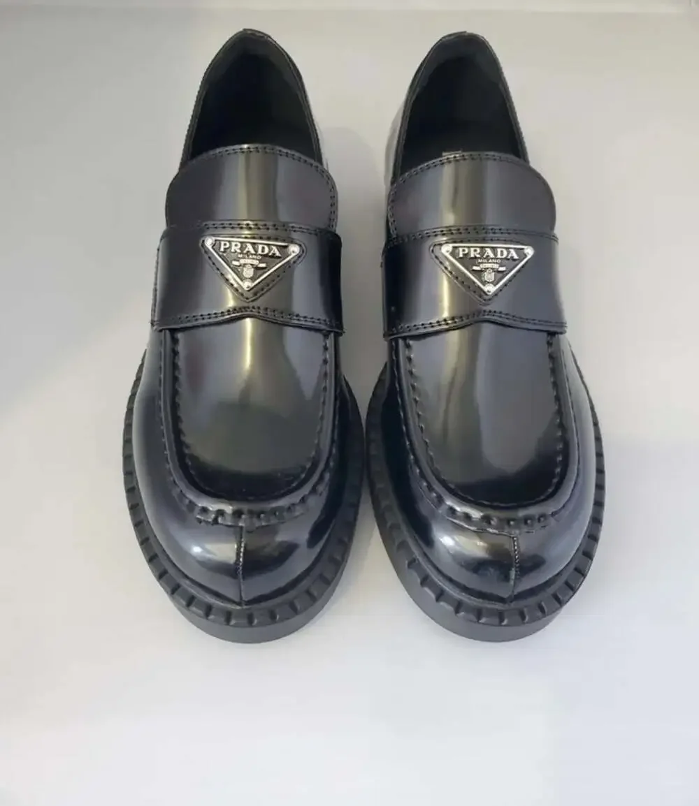 Prada Spazzolato Brushed Leather Loafers with Metal Triangle Logo